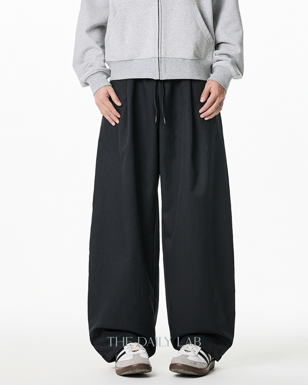 Pleated Loose-Fit Curved-Leg Pants in Black