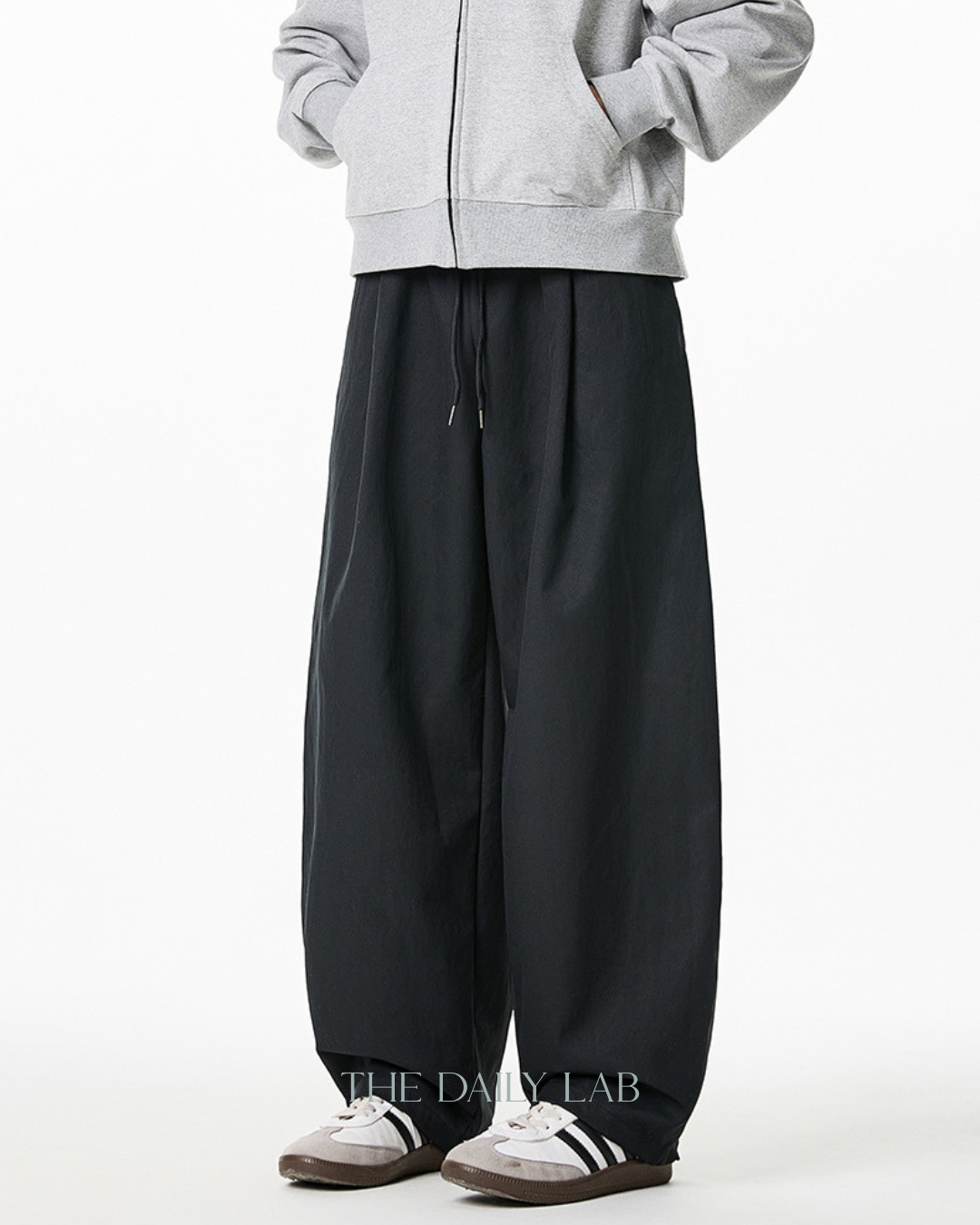 Pleated Loose-Fit Curved-Leg Pants in Black