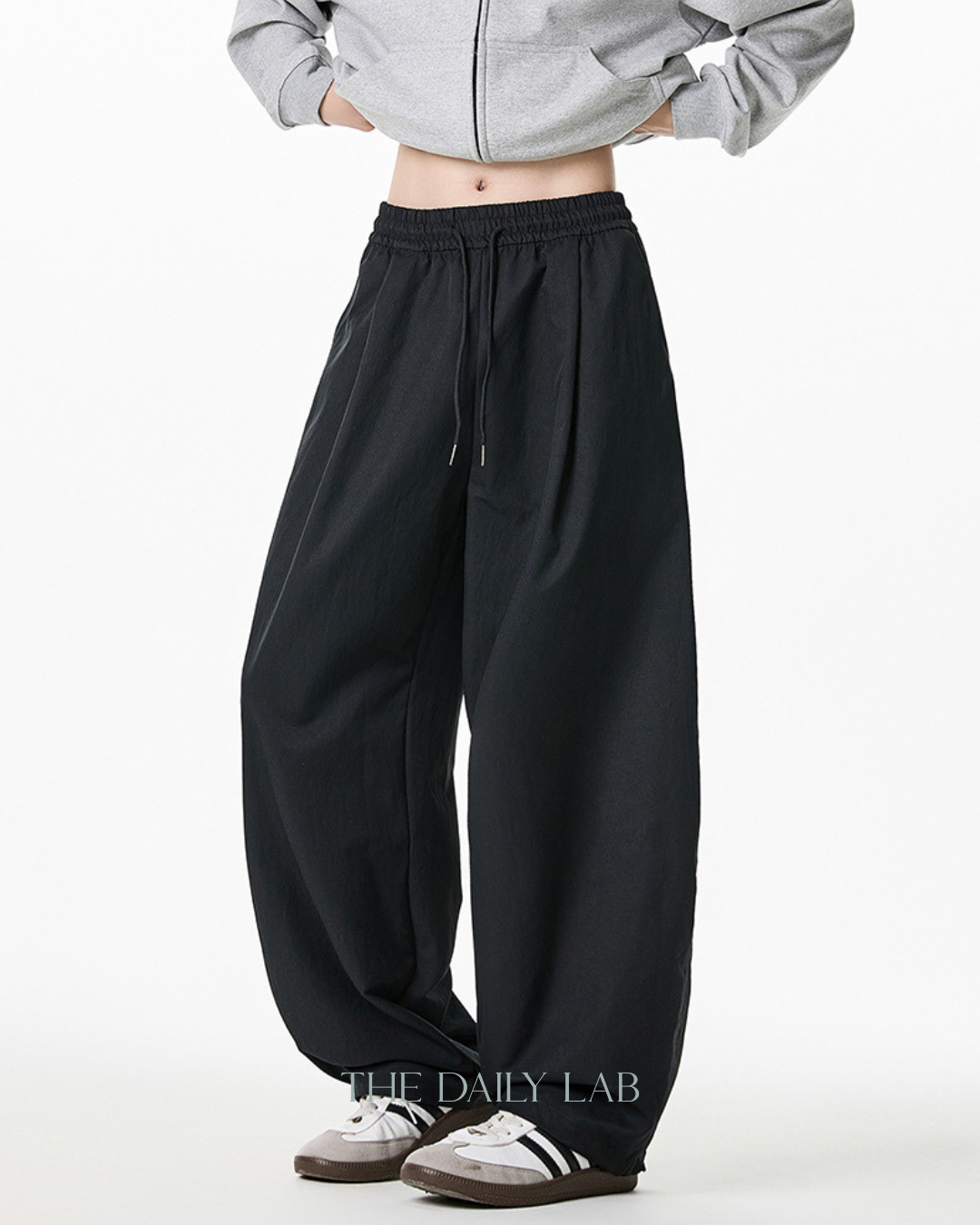 Pleated Loose-Fit Curved-Leg Pants in Black
