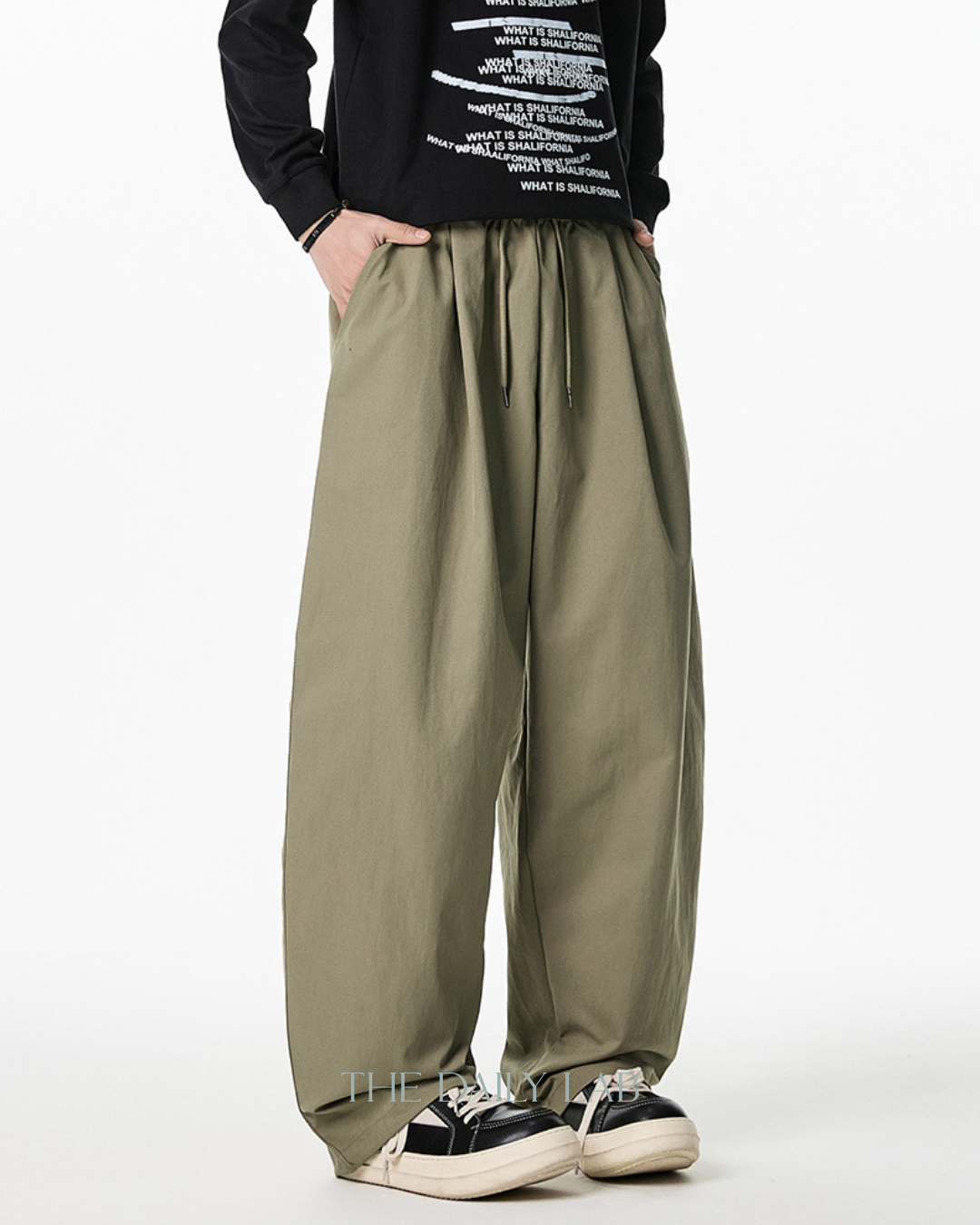 Pleated Loose-Fit Curved-Leg Pants in Khaki