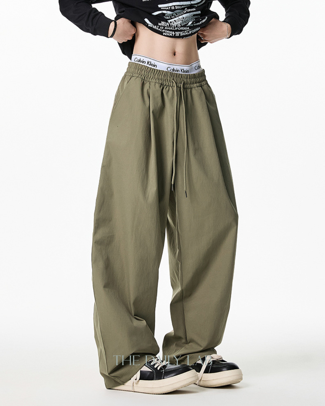 Pleated Loose-Fit Curved-Leg Pants in Khaki