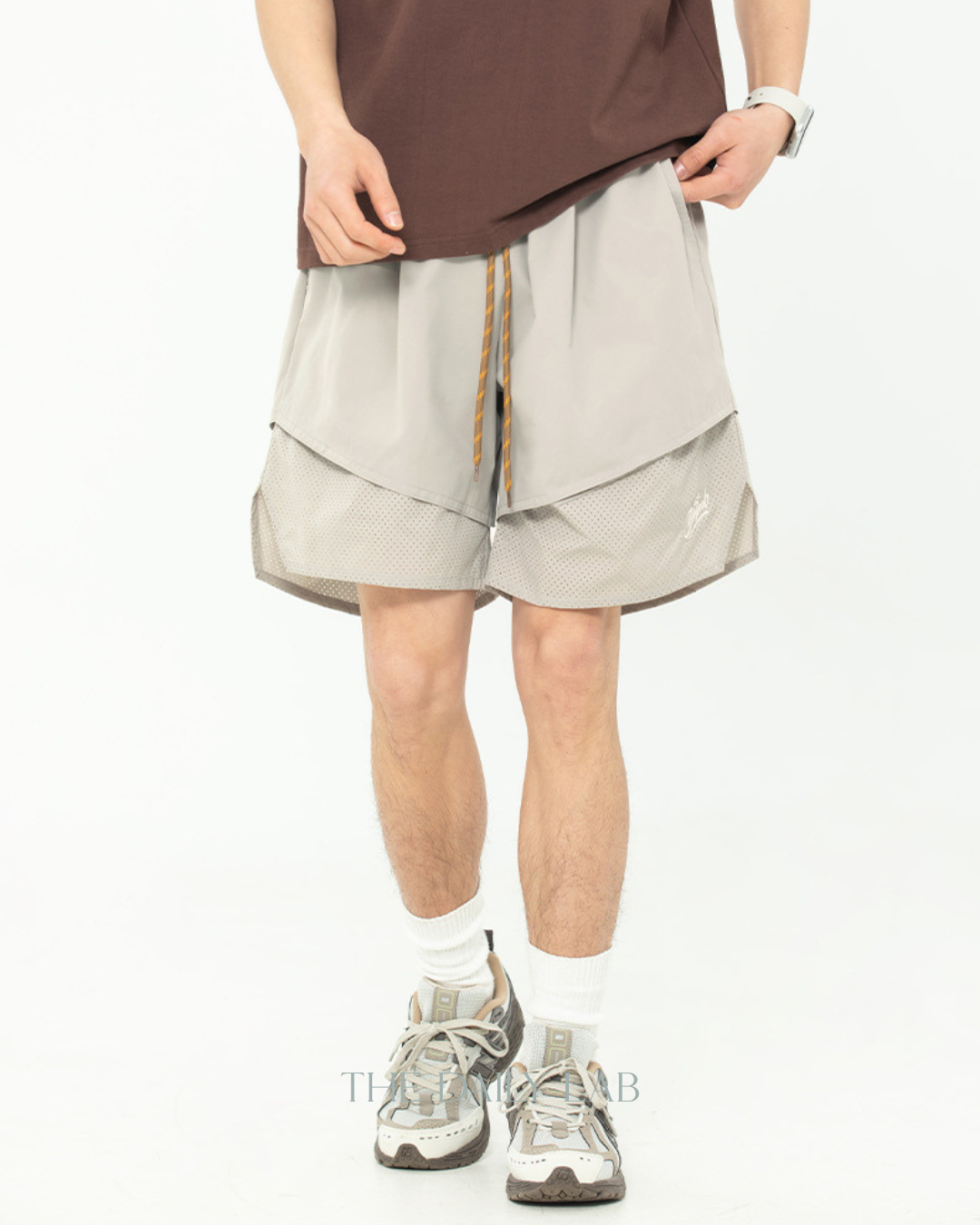 Split-Hem Ventilated Training Shorts in Beige