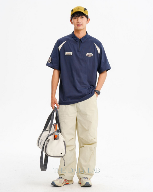 Logo Zipper Polo Shirt in Navy Blue