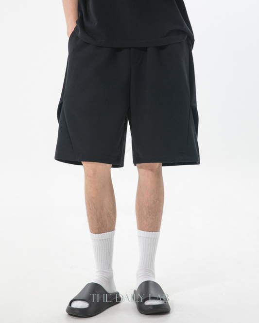 Geometric Pleated Shorts in Black