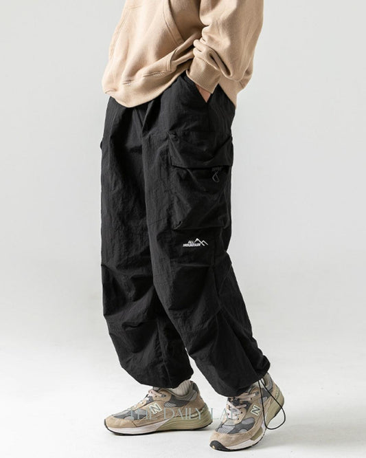 All Mountain Pocketed Cargo Trousers in Black