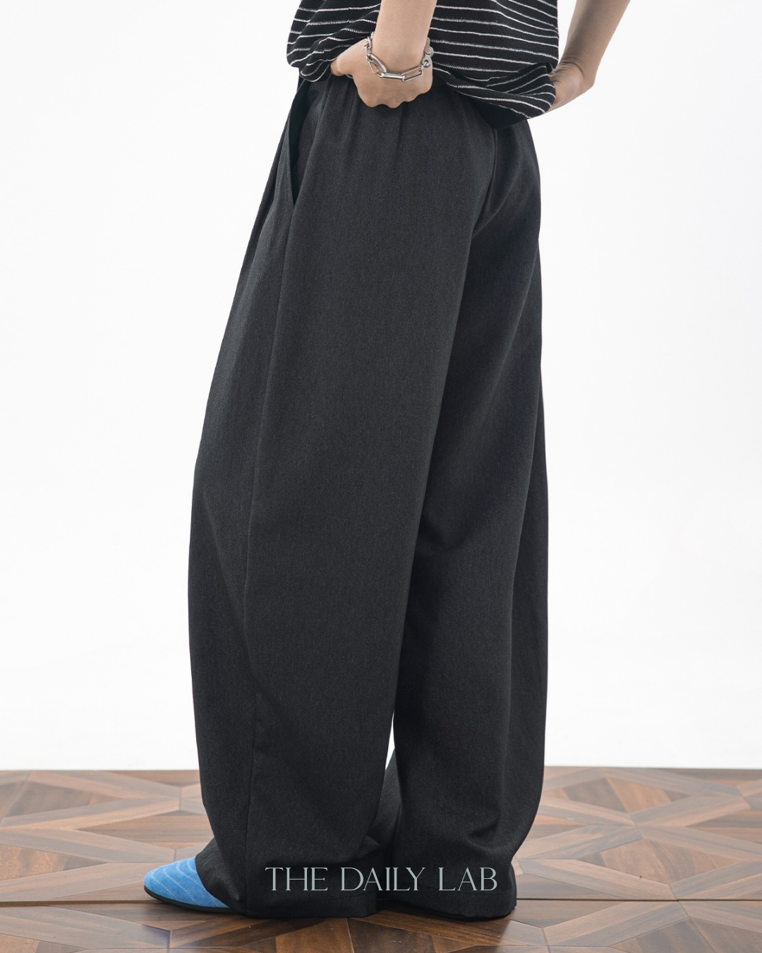 Relaxed Curved-Leg Trousers in Black