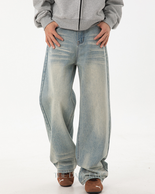 whisker washed distressed jeans In Blue